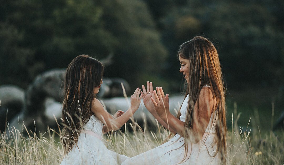 Cooperation Between Siblings and Adults Alike